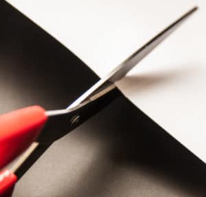 left handed scissors cutting paper image