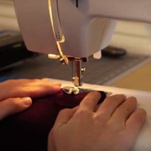 how does a sewing machine work