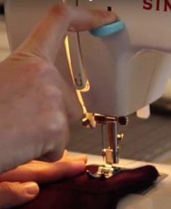 singer sewing machine reverse stitching lever