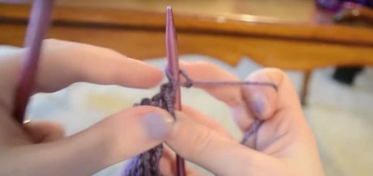 knitting pulling the stitch through